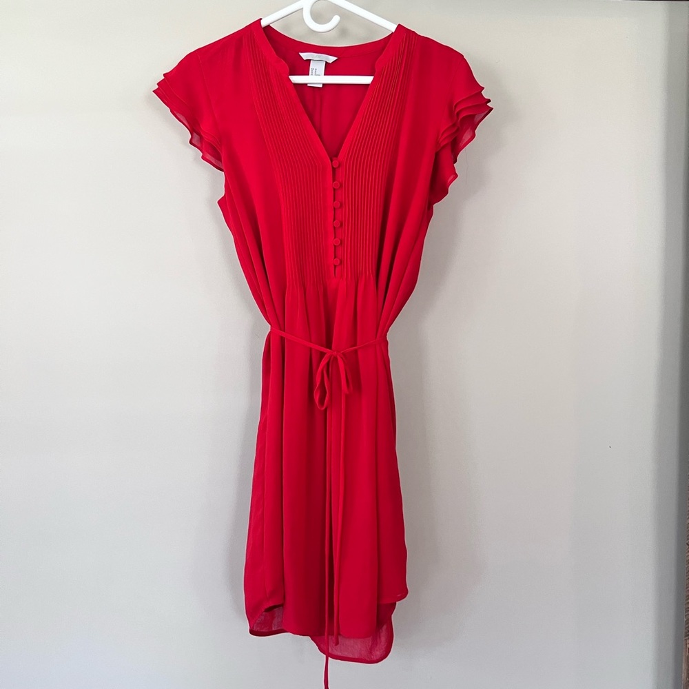 Red H&M lined dress with pleated chest, tiered flutter sleeves and buttons